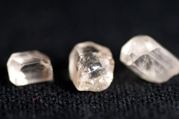 small flawed white diamonds not gem stone quality with occlusions